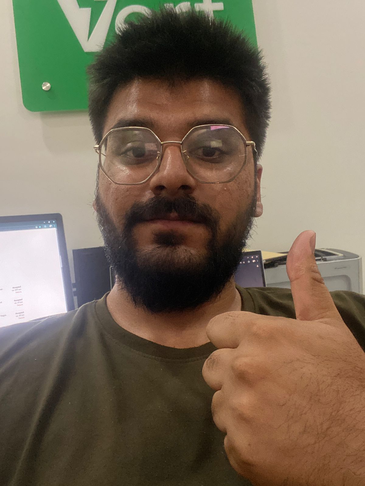 Muhammad Rohail giving a tired thumbs up after fixing a critical API bug late at night